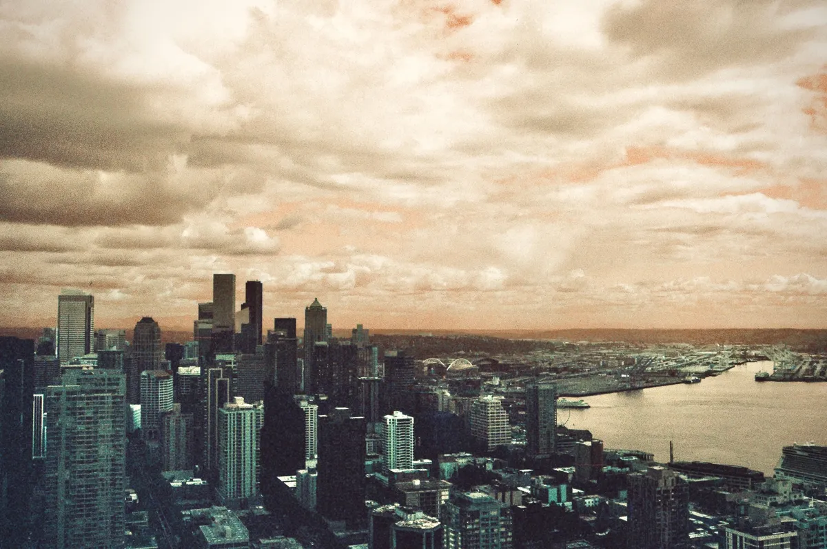 The skyline and waterfront beneath a textured cloudy sky in Seattle