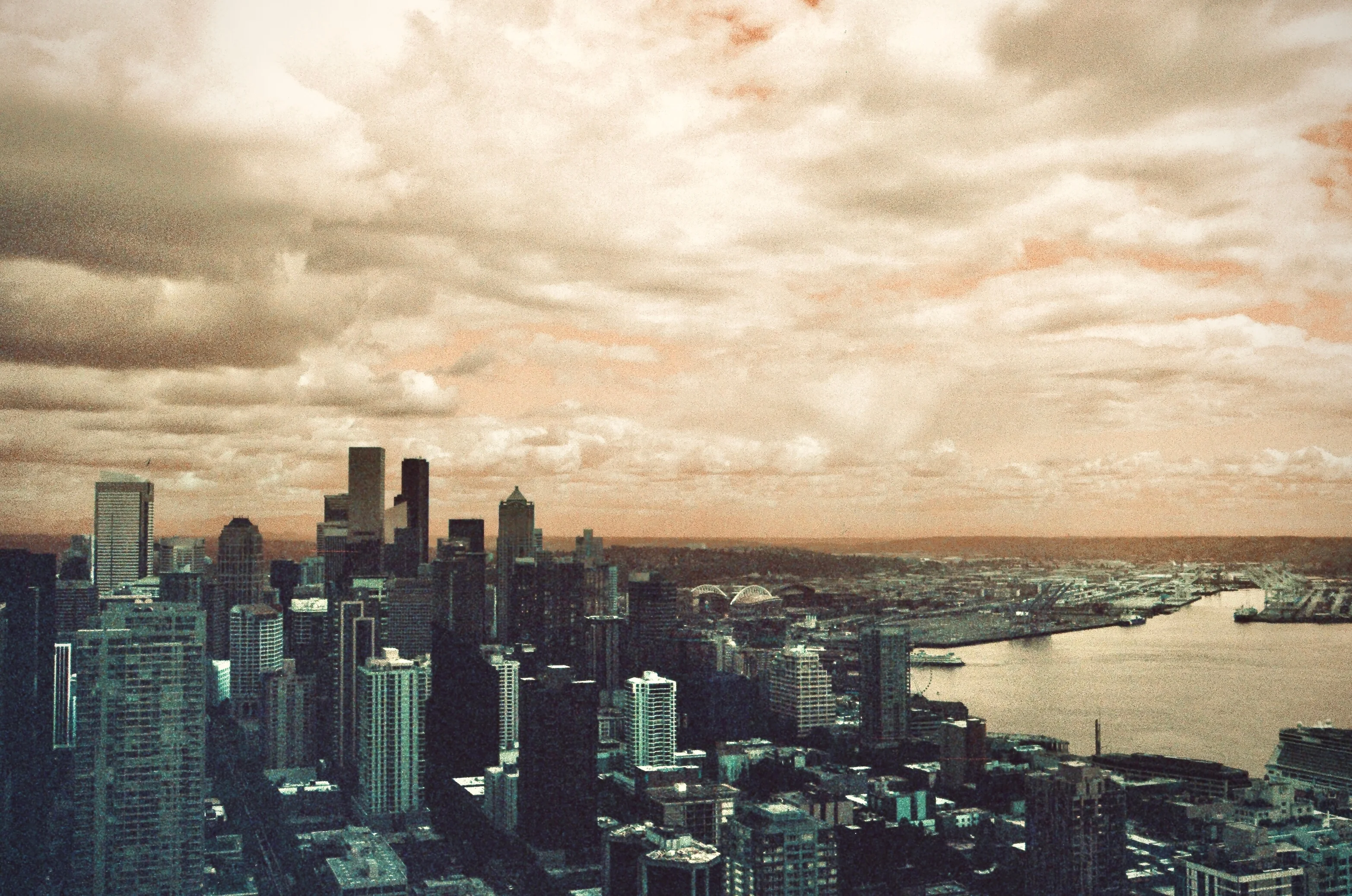 The skyline and waterfront beneath a textured cloudy sky in Seattle