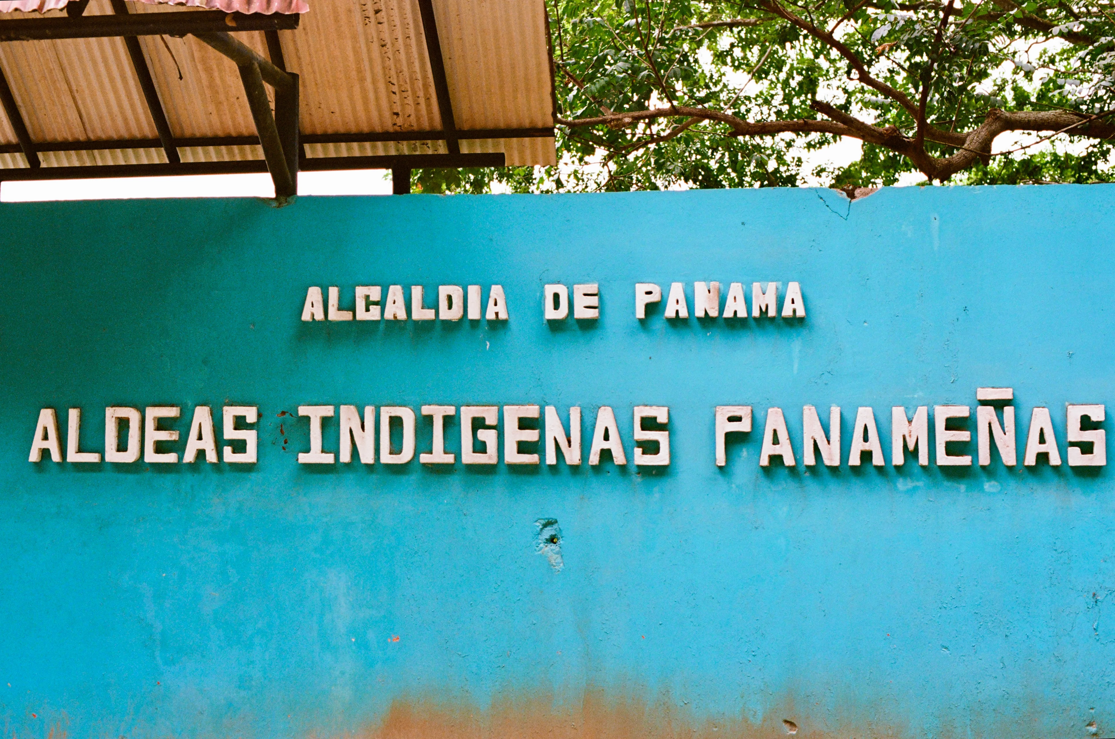A turquoise wall marked Aldeas Indígenas Panameñas in Panama City